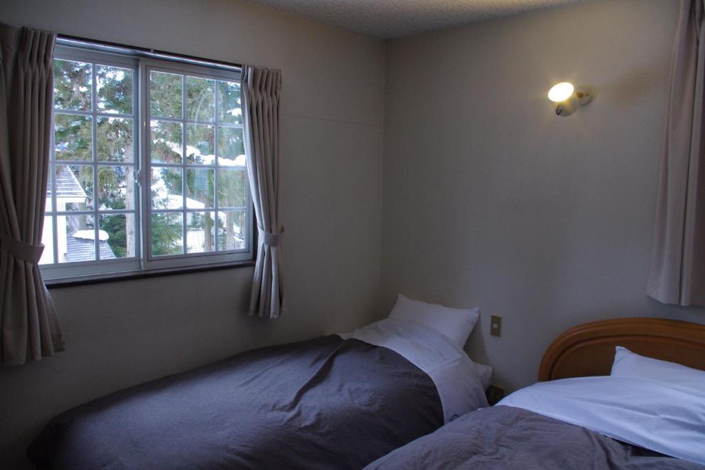 Sunny Side Hut Bed and Breakfast Χακούμπα Δωμάτιο φωτογραφία